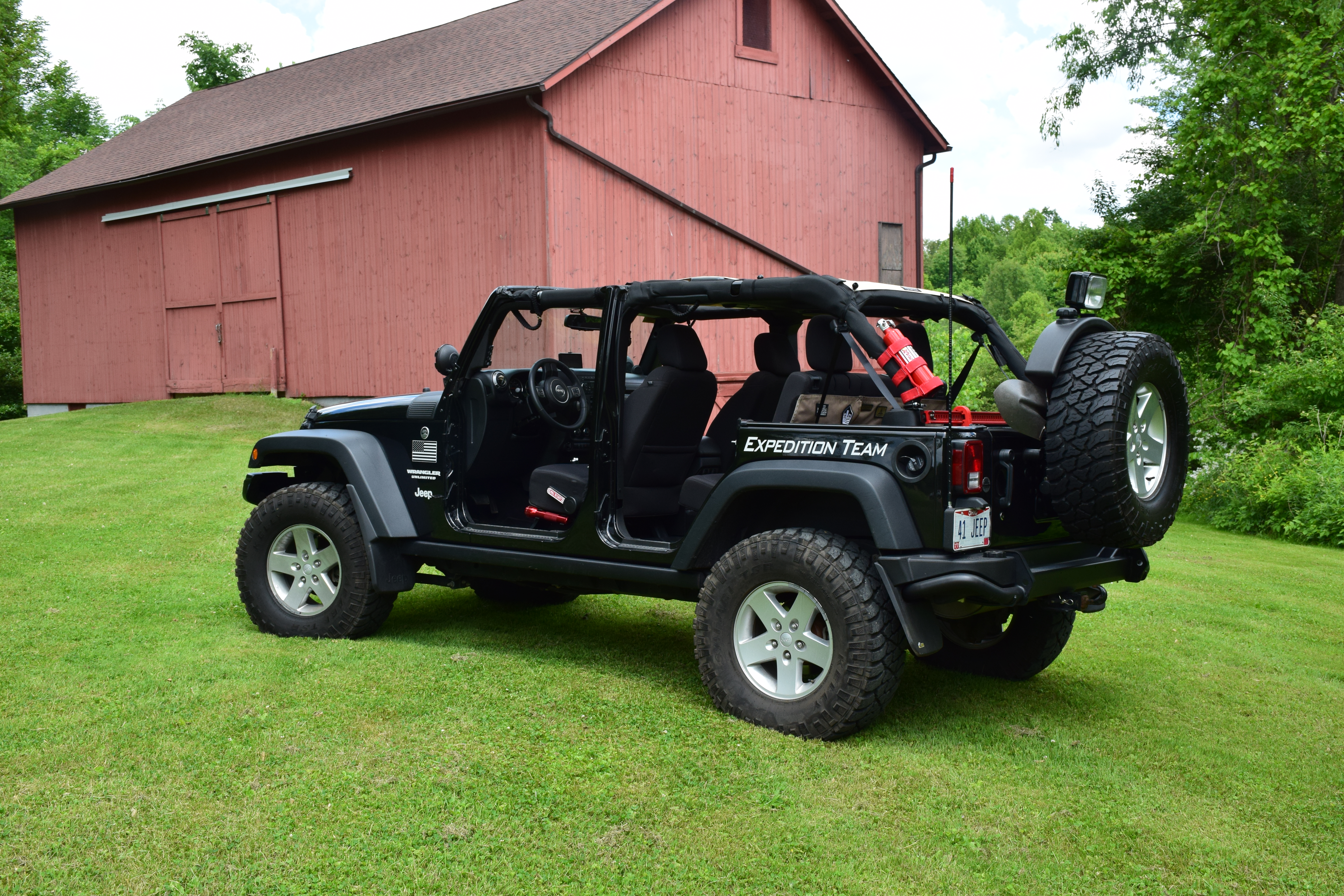 Open-door view of the 2013 Jeep Wrangler's expedition-ready cabin and trail equipment