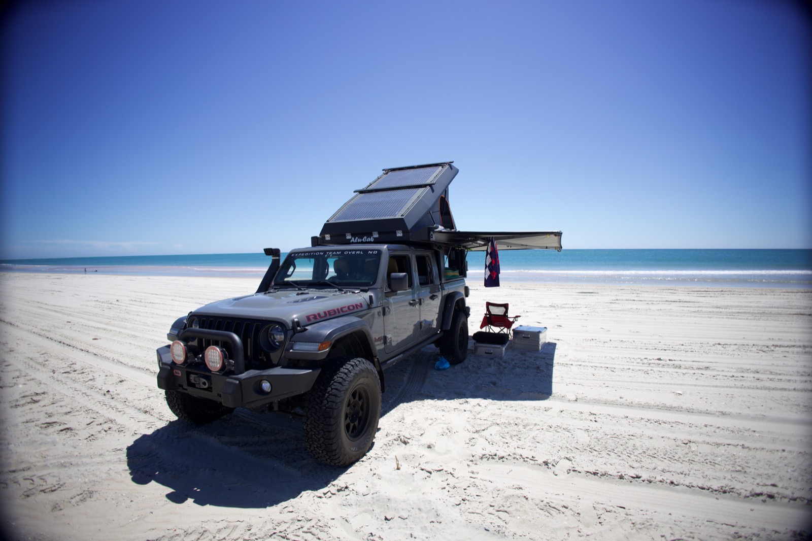 Jeep Gladiator expedition build traveling through rugged terrain